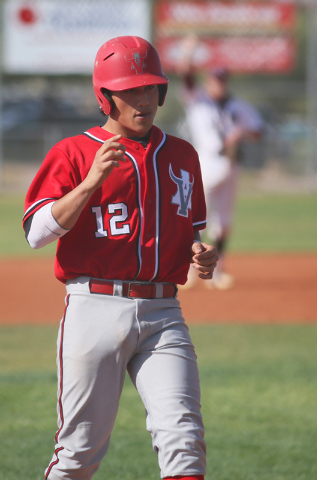 Arbor View’s Nick Quintana crosses home plate after hitting a home run in a baseball g ...