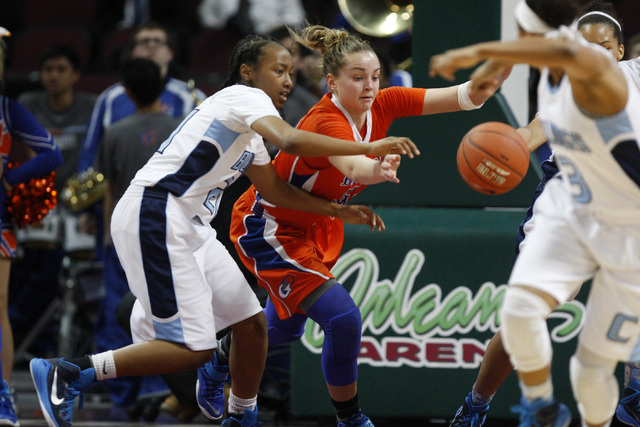 Centennial guard Justice Ethridge and Bishop Gorman guard Megan Jacobs chase a loose ball du ...