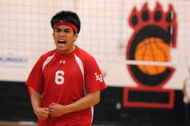 Las Vegas’ Shayne Marquez (6) celebrates a point during the Sunrise Region boys volley ...