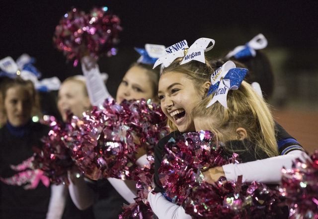 Sierra Vista senior cheerleader Megan Lynes celebrates with her squad after the Mountain Li ...