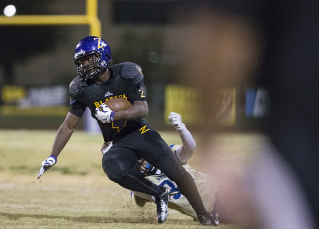 Durango wide reciever Justice Stroy (2) sprints down the sideline on Friday, Oct. 21, 2016, ...