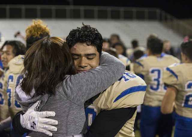 Sierra Vista’s Luis Delarosa (48) celebrates with teammates after knocking off Durango ...