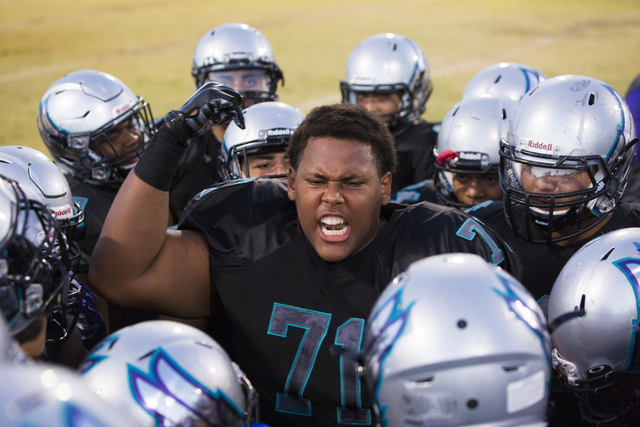 Silverado lineman Ryan Scoggins (71) fires up his teammates before the start of the Skyhawks ...