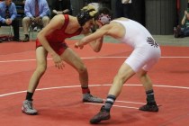 Western’s Erik Gonzalez ties up with Elko’s Aram Villegas in the first round of ...