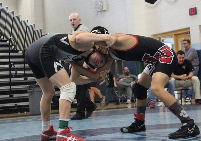 Virgin Valley freshman Ty Smith (left) ties up with Las Vegas freshman Antonio Saldate durin ...