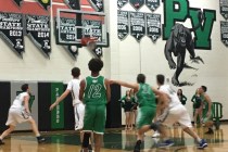 Green Valley senior Eric Johnson (12) watches his 3-point shot go in against Palo Verde duri ...