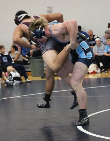 Centennial’s Hunter Brown, right, begins his quest to repeat as the 195-pound Sunset R ...