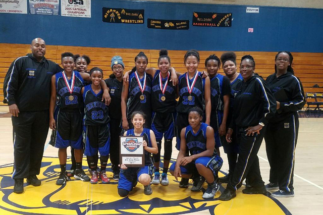 Cheyenne’s players and coaches pose with the second-place trophy from the West Coast J ...