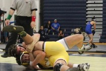 Shadow Ridge’s John Scarpati locks up Temecula Valley’s Stephen Sparacino during ...