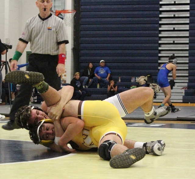 Shadow Ridge’s John Scarpati locks up Temecula Valley’s Stephen Sparacino during ...