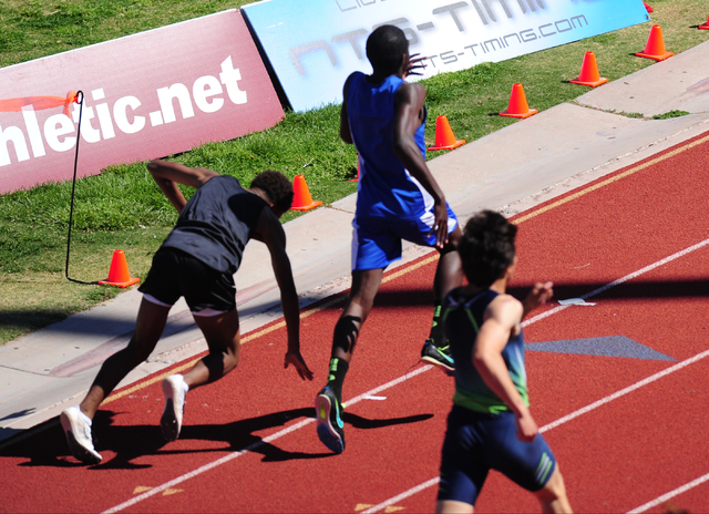 Palo Verde’s Christian Jackson, left, falls near the finish line while racing Sierra V ...