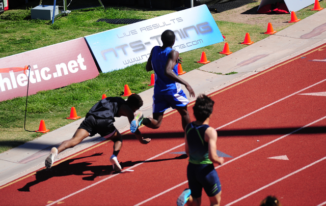 Palo Verde’s Christian Jackson, left, falls near the finish line while racing Sierra V ...