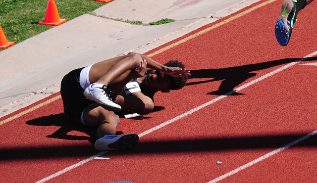 Palo Verde’s Christian Jackson, left, falls near the finish line while racing Sierra V ...