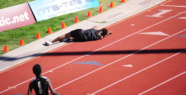 Palo Verde’s Christian Jackson, left, falls near the finish line while racing Sierra V ...