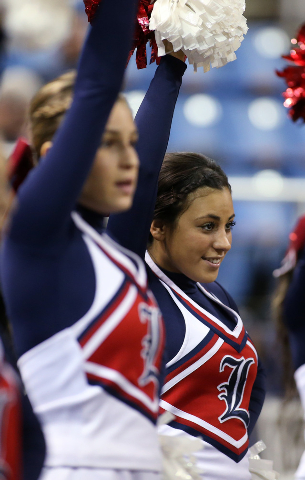 Liberty cheerleaders watch a Division I state semifinal game on Thursday at UNR’s Lawl ...