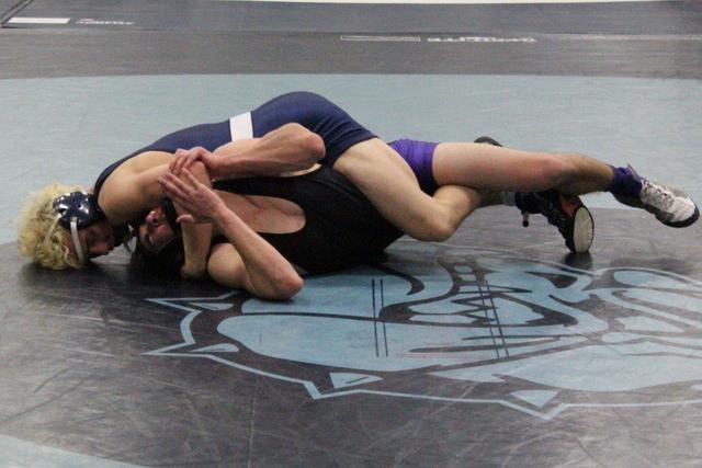 Shadow Ridge’s Jonah McKee works a crossface against Durango’s Timothy Kryder, n ...