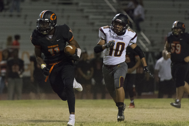 Chaparral’s Kentrell Petite (11) runs with the ball during a football game against Eld ...