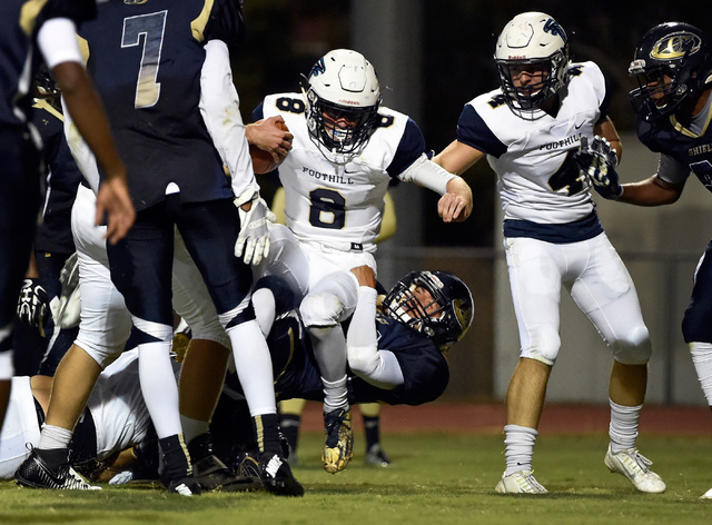 Foothill’s Blake Wilson (8) crosses the goal line against Cheyenne’s Joseph Kuni ...