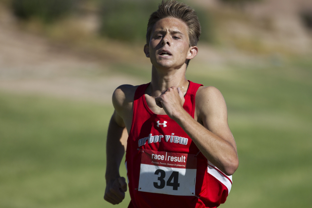 Arbor View’s Andrew Parker runs to the finish line to take 10th place in the cross cou ...