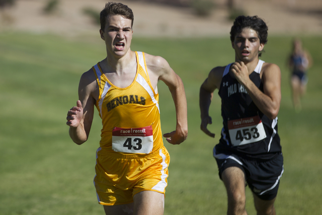 Bonanza’s Brandon Adams, left, and Palo Verde’s Trevor Goldsmith run to the fini ...