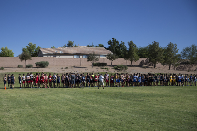 Boys varsity runners get ready to compete in the cross country Palo Verde Labor Day Classic ...