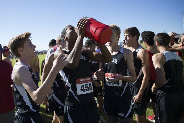 Palo Verde’s Dwight Jones drinks water before his race in the cross country boys varsi ...