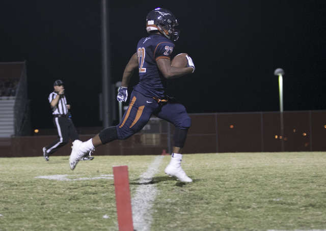 Legacy’s Sam Turner (22) crosses into the end zone for a touchdown against Moapa Valle ...