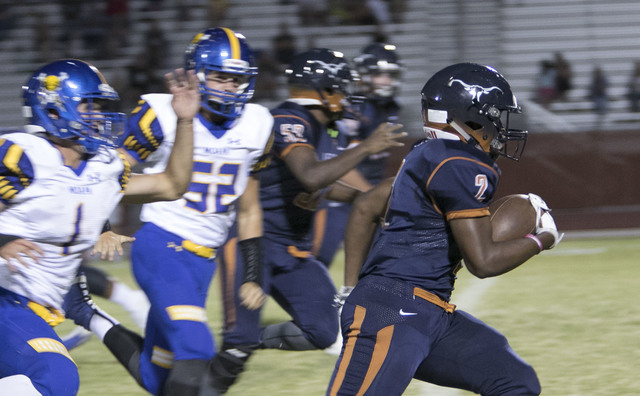 Legacy’s Lamondrel Edmond Jr. (2) runs for a touchdown against Moapa Valley during a v ...