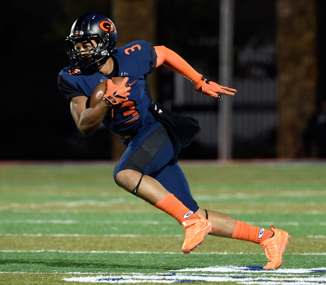 Bishop Gorman’s Jalen Nailor carries against Palo Verde during the first half of a hig ...