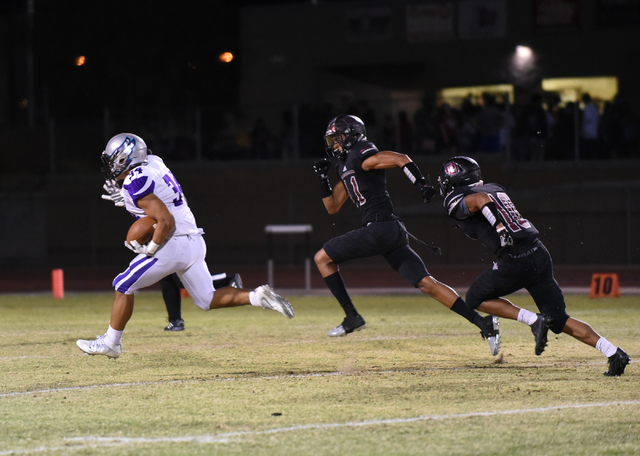 Silverado’s Keikiokalani Misipeka (34) runs down field for a touchdown against Desert ...