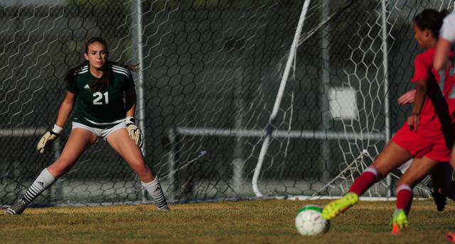 Palo Verde goalkeeper Kailee Barnhard (21) watches as a shot from Arbor Views’s Deja E ...