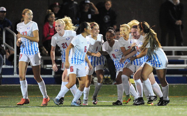 Bishop Gorman players celebrate a goal against Desert Oasis during their prep soccer game at ...