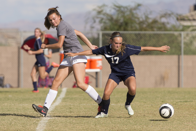 Centennial’s Katelyn Levoyer (17) runs for the ball against Arbor View’s Jolie M ...