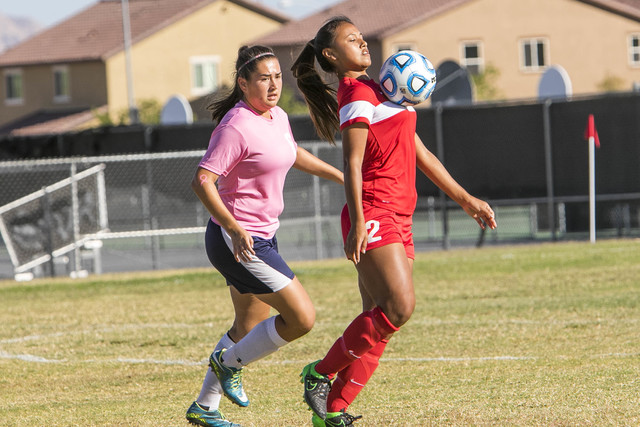 Western’s Ellyson Reynada (2) controls with her chest against Cheyenne’s Soraya ...