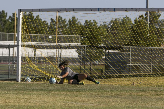 Cheyenne goalkeeper Shayna Thompson blocks a shot from a Western player during a varsity soc ...