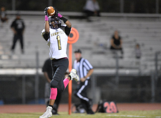 Sunrise Mountain senior Tyree Hayes (1) catches a pass during the Cheyenne High School Sunri ...