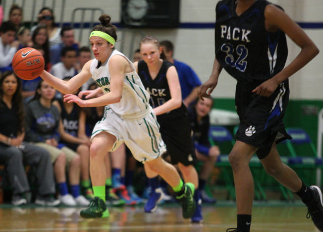 Green Valley’s Rianna Rudolph (20) drives against Basic during the quarterfinals of th ...