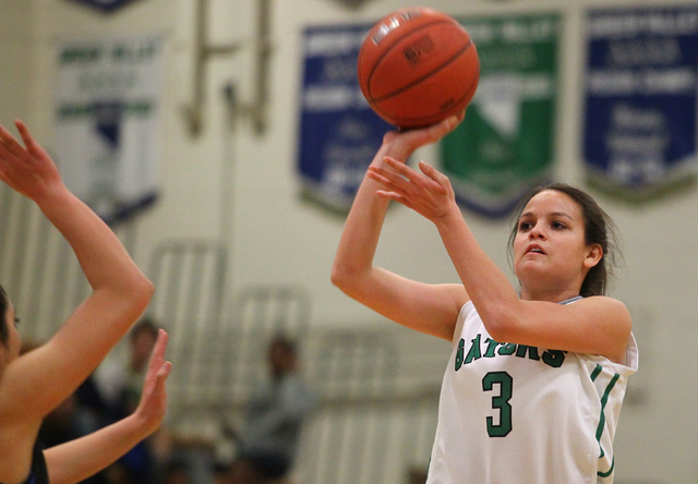 Green Valley’s Cassandra Palor (3) looks to shoot against Basic during the quarterfina ...