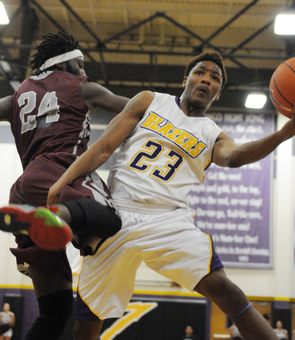 Durango’s Vee Price (23) takes a shot over Cimarron-Memorial’s Cameron McKissic ...