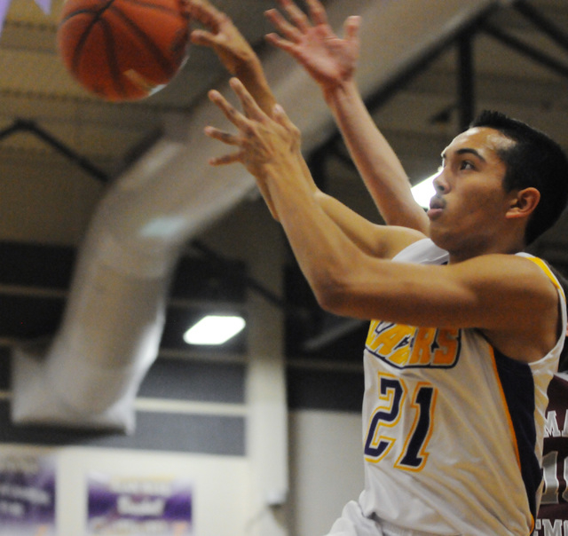 Durango’s Jeff Diaz (21) fakes a shot against Cimarron-Memorial on Wednesday. Durango ...