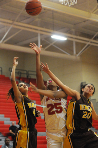 Arbor View’s Dana Lewis (25) takes a shot over Bonanza’s Brooklyn Savage (20) an ...