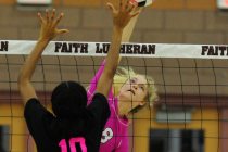 Faith Lutheran’s Bryanna Neagle (8) kills the ball against Palo Verde during their pre ...