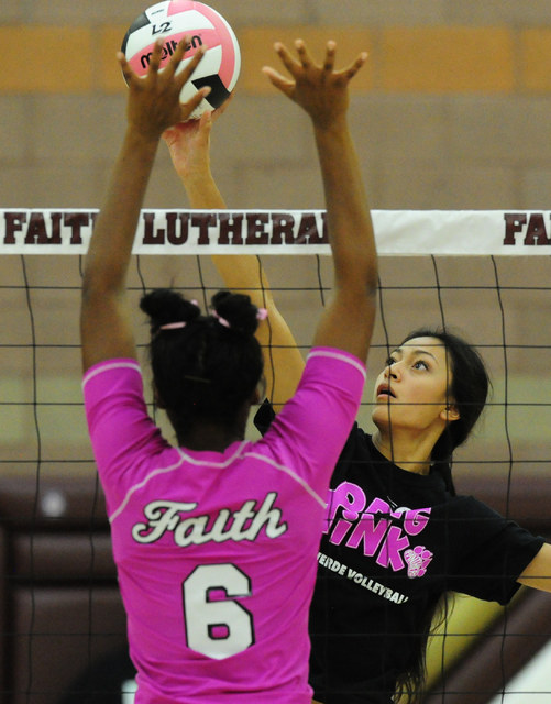 Palo Verde’s Aaliah Largusa spikes the ball against Faith Lutheran’s Sydney Wash ...