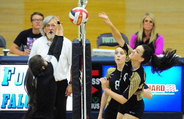 Foothill’s McKenzie Youngman, right, spikes the ball against Palo Verde’s Riley ...