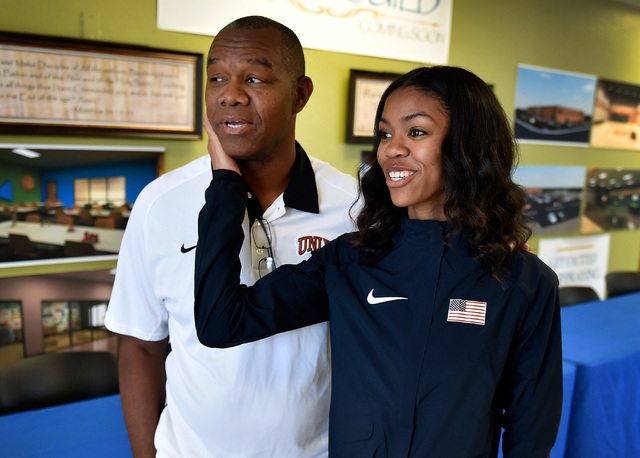 Bishop Gorman high jumper Vashti Cunningham, right, looks up to her father, former UNLV and ...