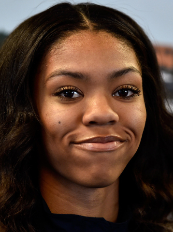 Bishop Gorman high jumper Vashti Cunningham smiles at a news conference at Remnant Ministrie ...