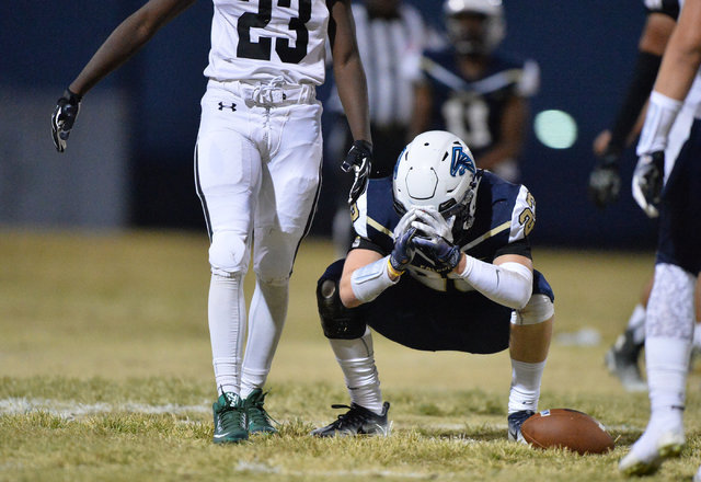 Foothill Falcons receiver Brandon Hargis reacts to dropping a pass during the Foothill High ...