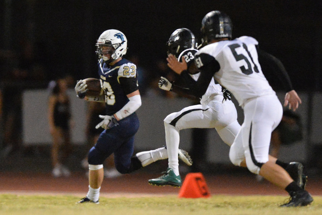 Foothill receiver Brandon Hargis (23) runs with the football during the Foothill High School ...