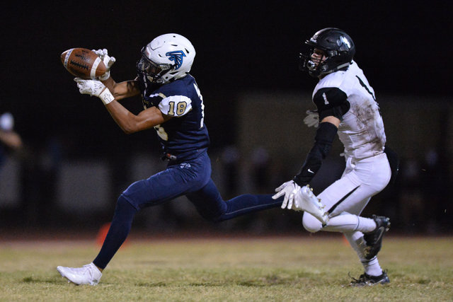 Foothill wide receiver Jordan Blakely (18) drops a pass during the Foothill High School Palo ...