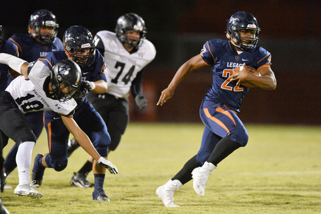 Legacy running back Sam Turner (22) runs the football during the Legacy High School Palo Ver ...